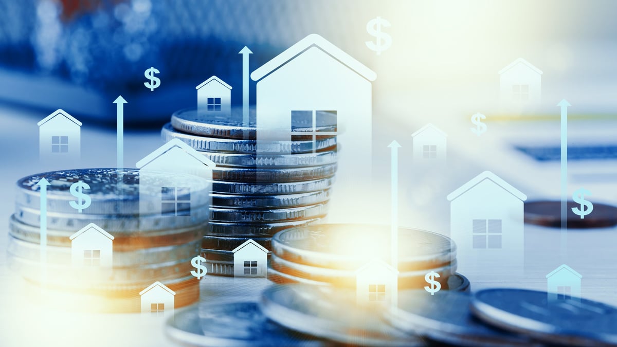 Rising coin stacks with house icons representing real estate value growth